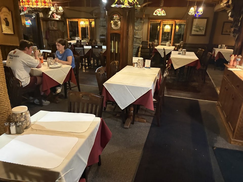 Raw bar counter and casual pub seating.