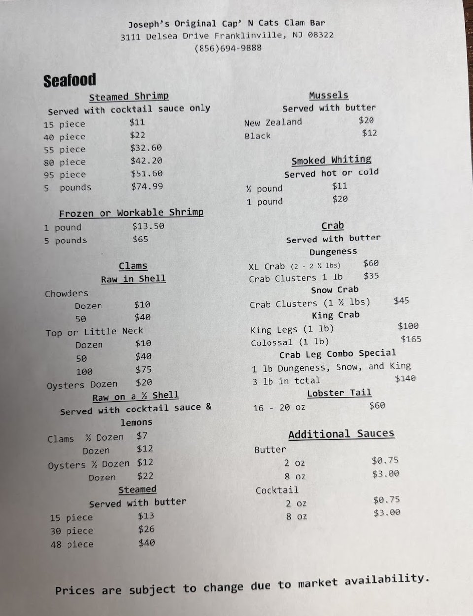Menu featuring steamed shrimp and clams.